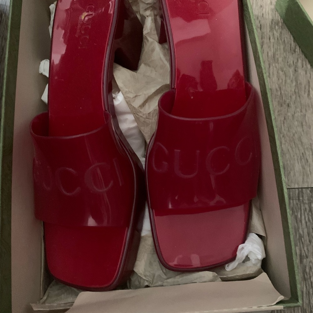 Red Gucci rubber slides